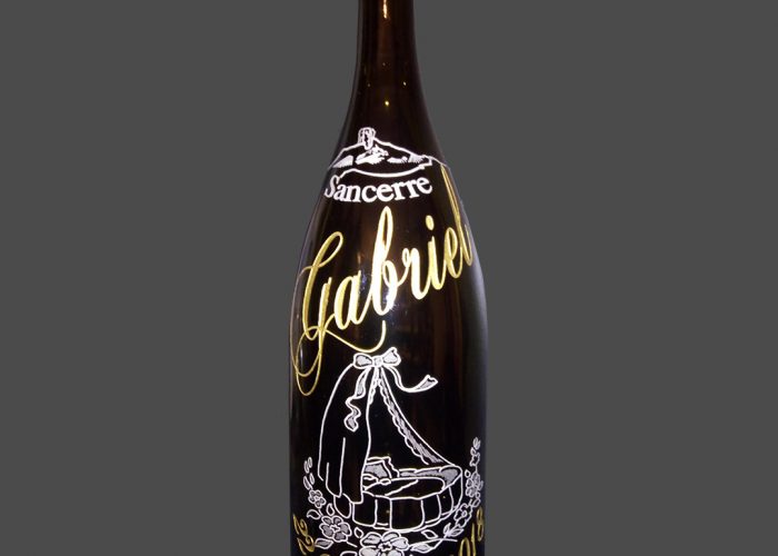 Bouteille gravée pour un baptême